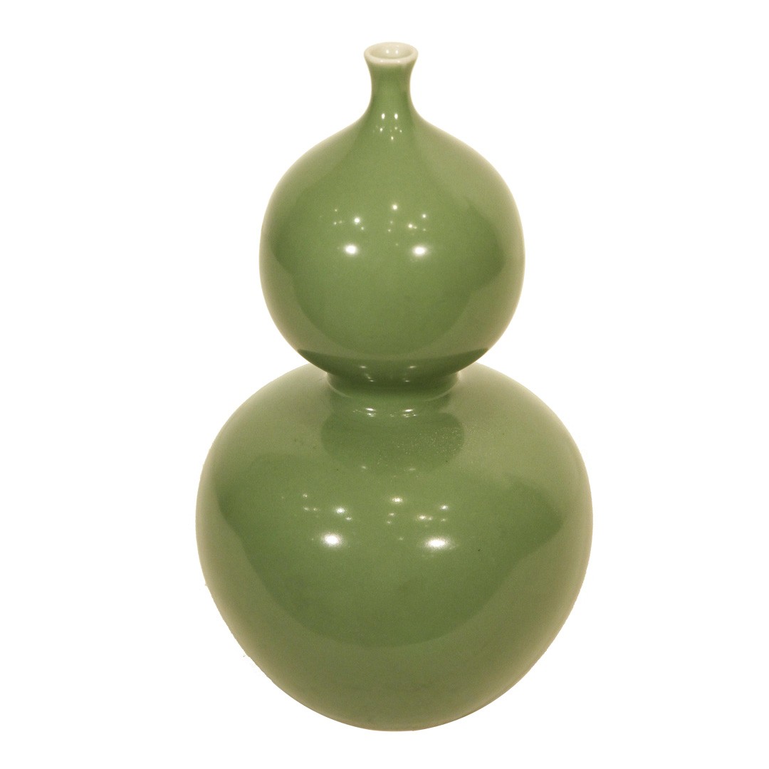 A Chinese porcelain monochrome green glazed double gourd vase